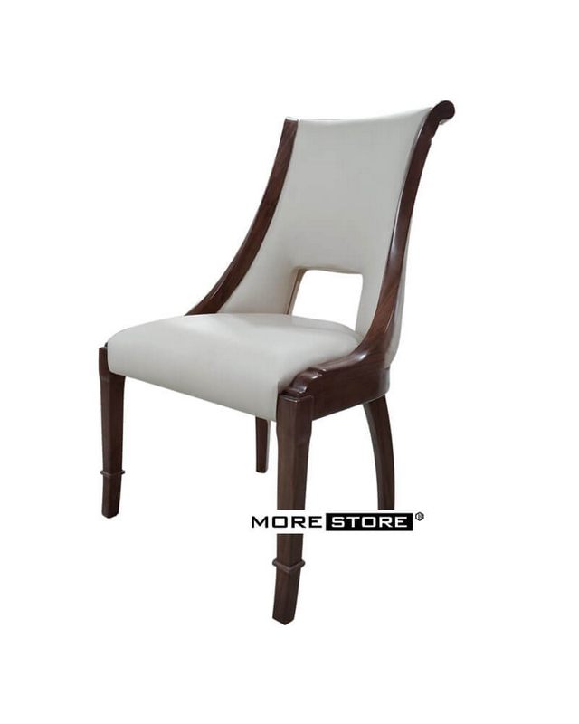 Ghế ăn gỗ tần bì bọc da cao cấp với phần lưng khuyết cách điệu kết hợp với bộ bàn ăn gỗ sang trọng sẽ tạo nên một vẻ đẹp đẳng cấp cho phòng ăn của gia chủ.